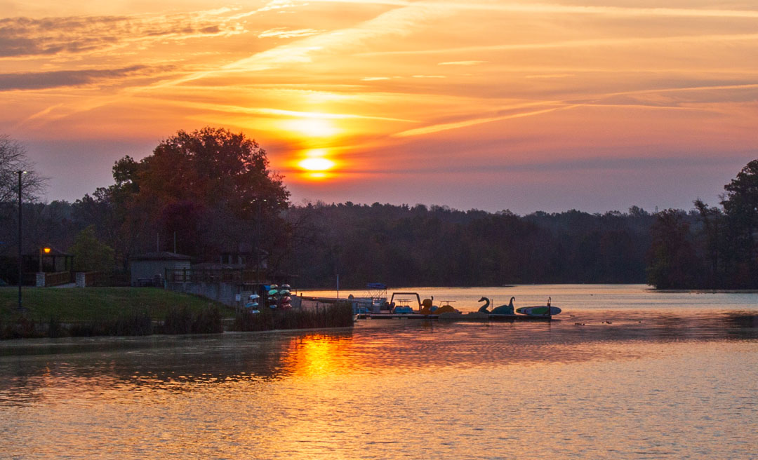 a sunset over a lake