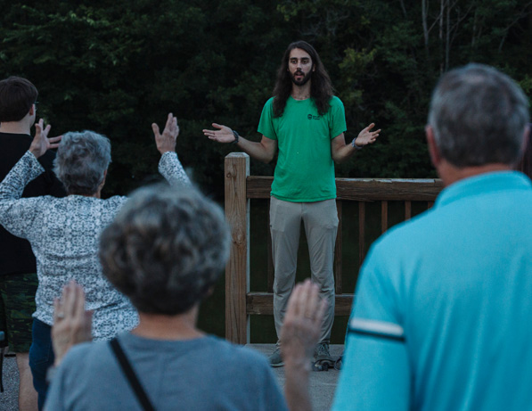 a man standing in front of a group of people