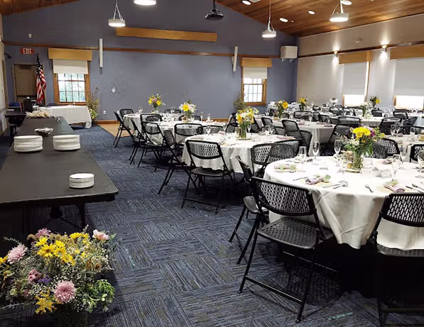 a room with tables and chairs